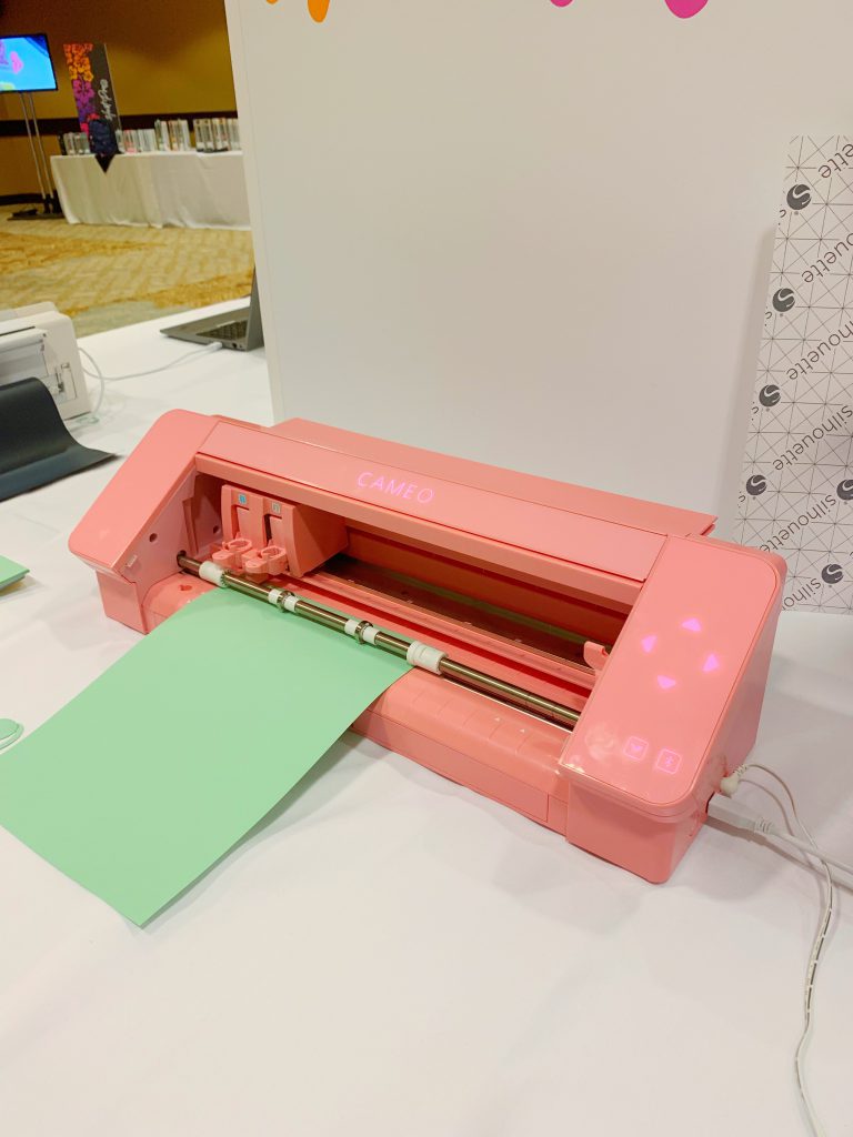 The Silhouette CAMEO 4 is an amazing new die cutting machine. Comes in pink, white, and black.