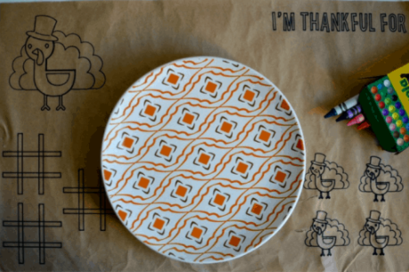 Diy Thanksgiving Placemats For Kids with turkey images for coloring and tic tac toe games. Text says I'm thankful for. 