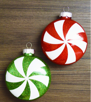 Glitter Christmas balls with peppermint candy graphic on them
