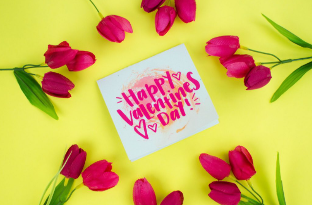 Valentine card with hearts and background marbled tie dye effect saying Happy Valentine's Day