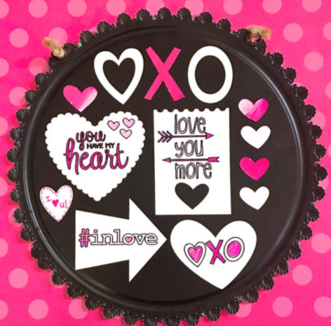Pizza pan magnet board with love, heart, and XO shaped magnets