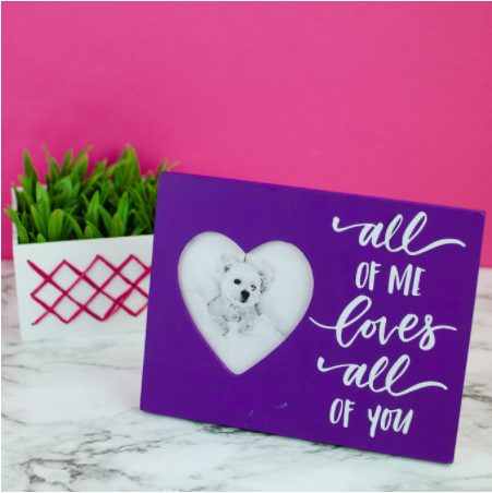 Valentines Day Photo Frame with heart shaped opening and text saying All of me loves all of you. 