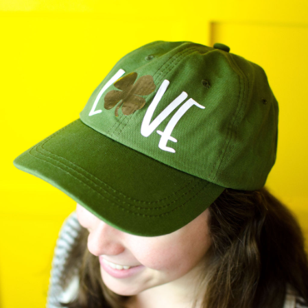 A color green Iron On Hat using Makers Gonna Learn cut file called Love Shamrock.