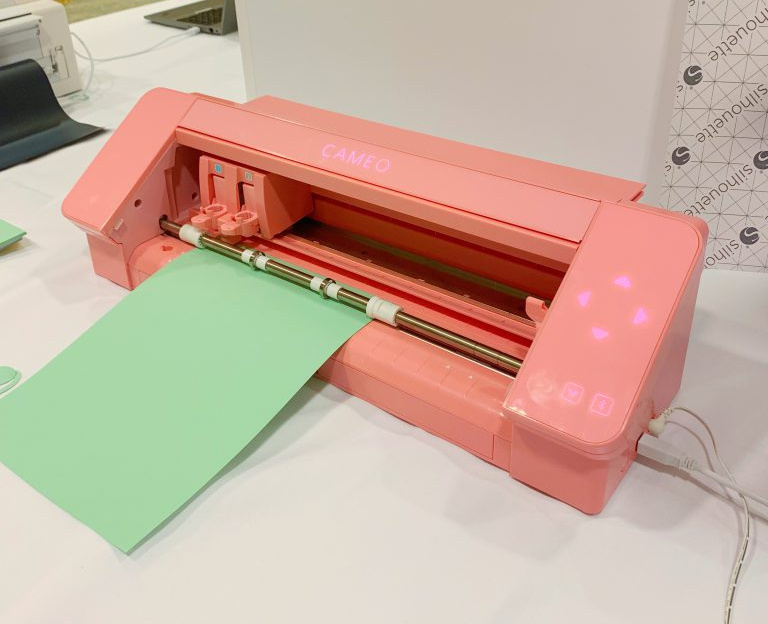 The Silhouette CAMEO 4 is an amazing new die cutting machine. Comes in pink, white, and black.