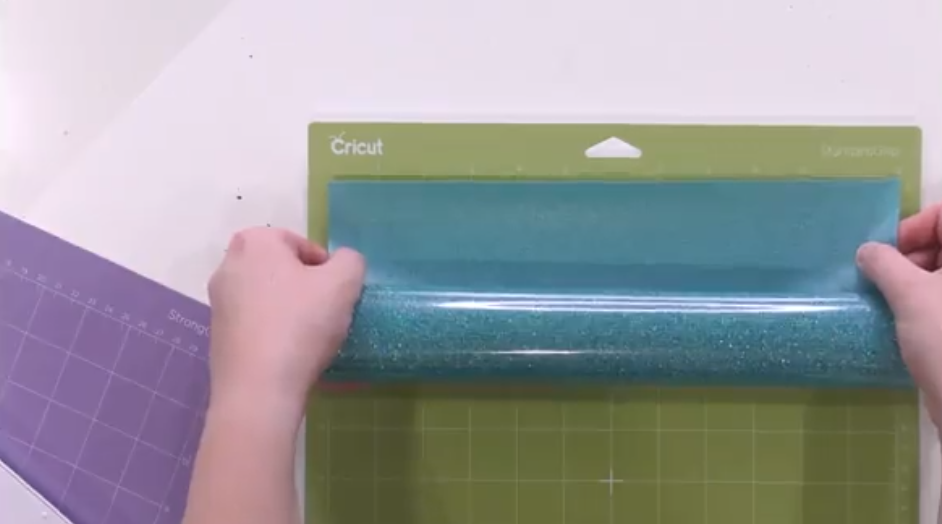 leave vinyl on the roll and apply it to the mat from the roll