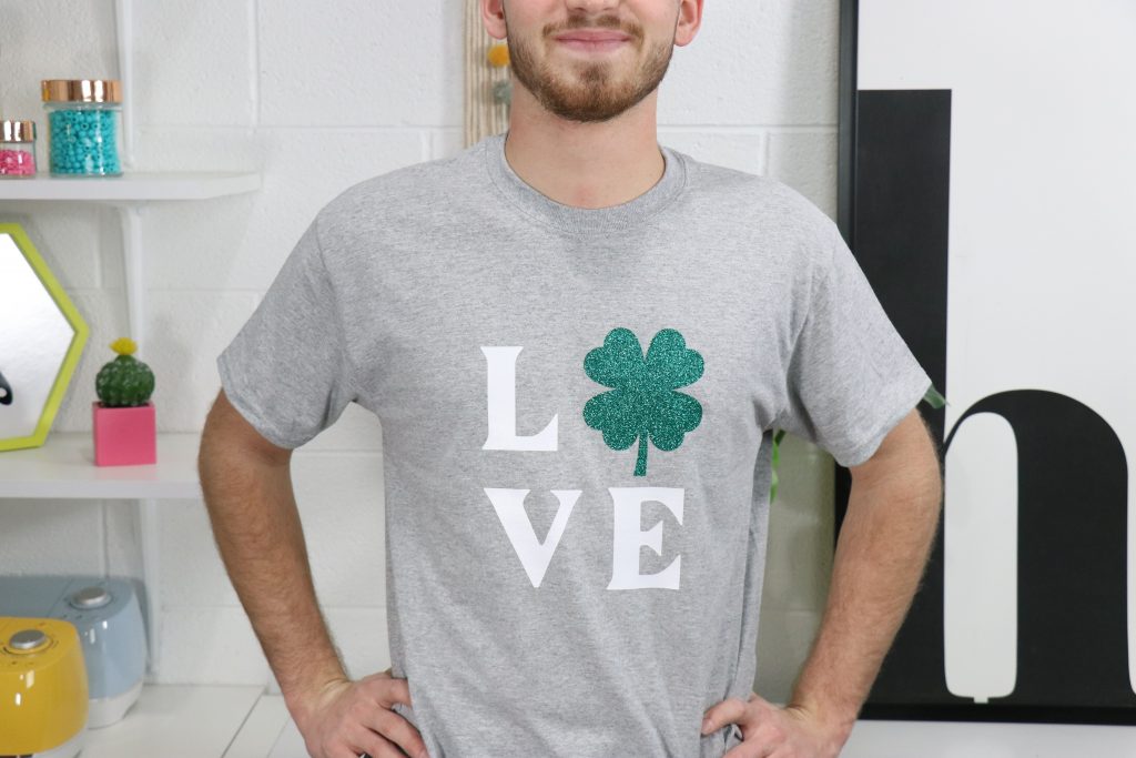 St Pattys Day Cricut Shirt that says love on it with a shamrock as the O