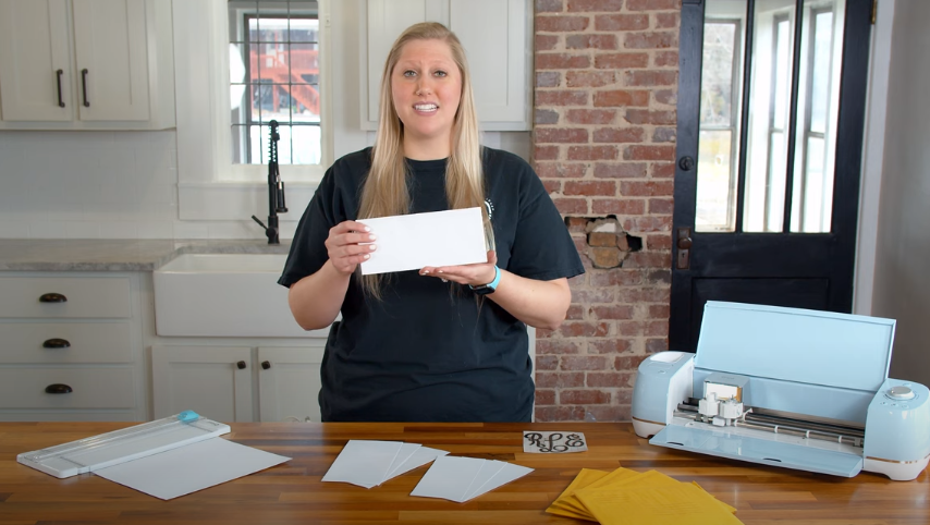 Woman Holding Business Sized Envelope