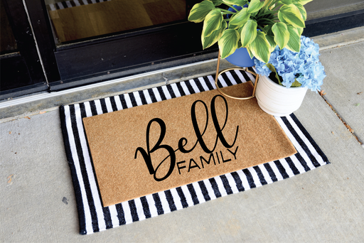 how to make a DIY welcome mat using freezer paper stencil 