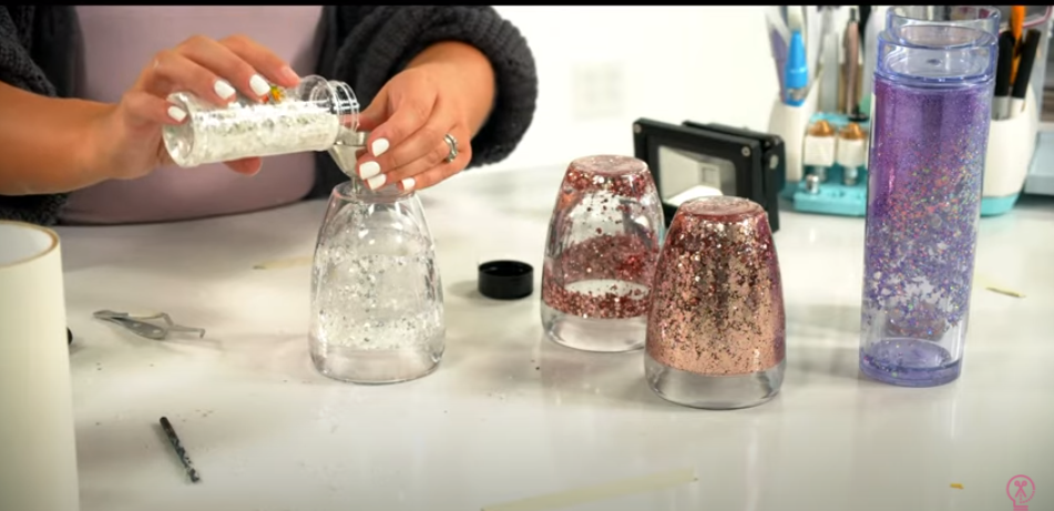 Pouring Glitter Through Funnel Into Tumbler