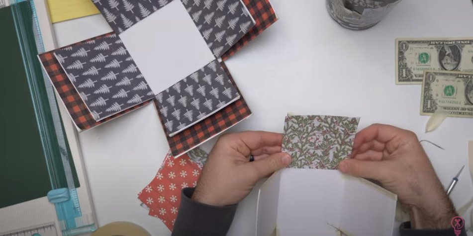 Use Tape Gun To Attach Paper To Box Flaps